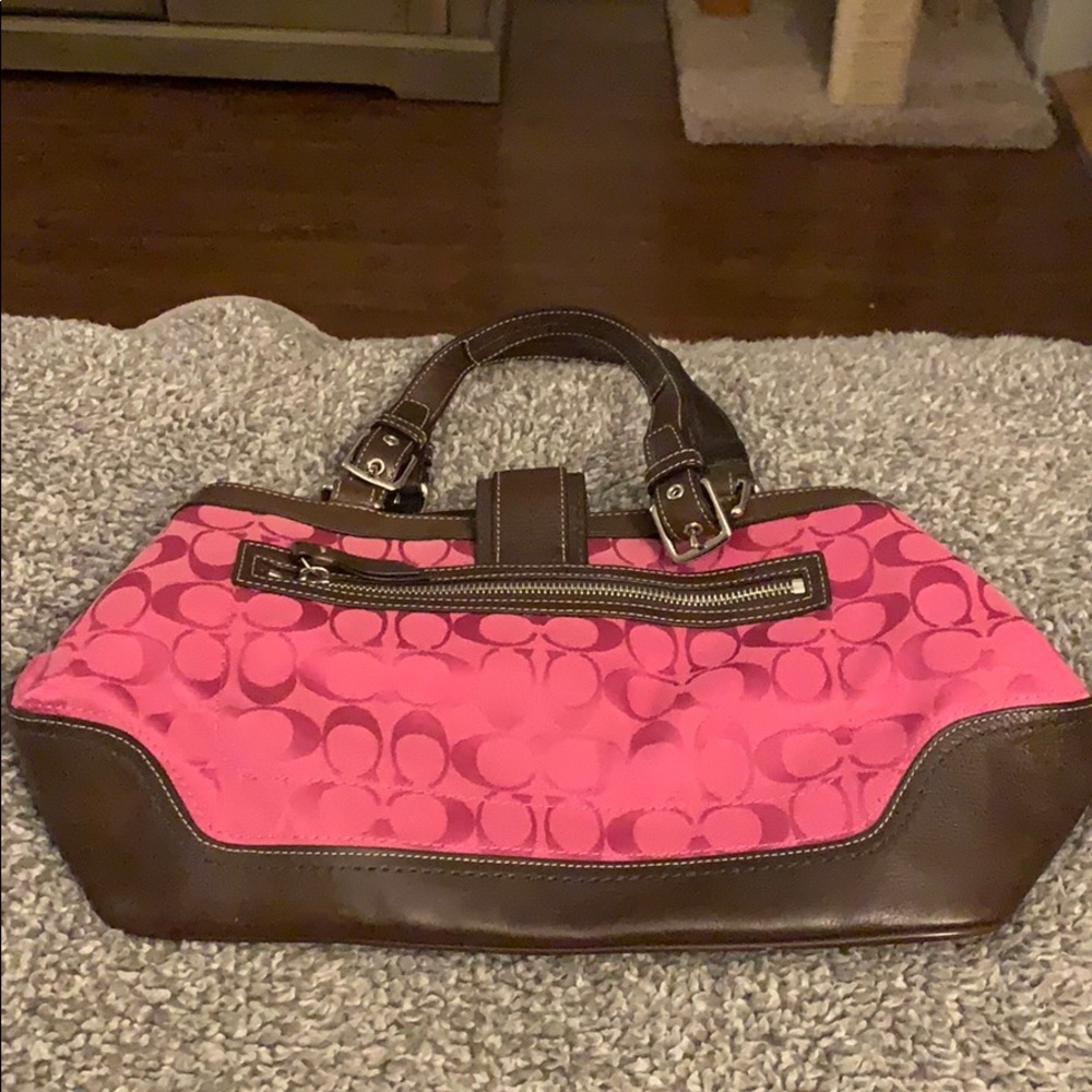 Pink Coach handbag with leather accents